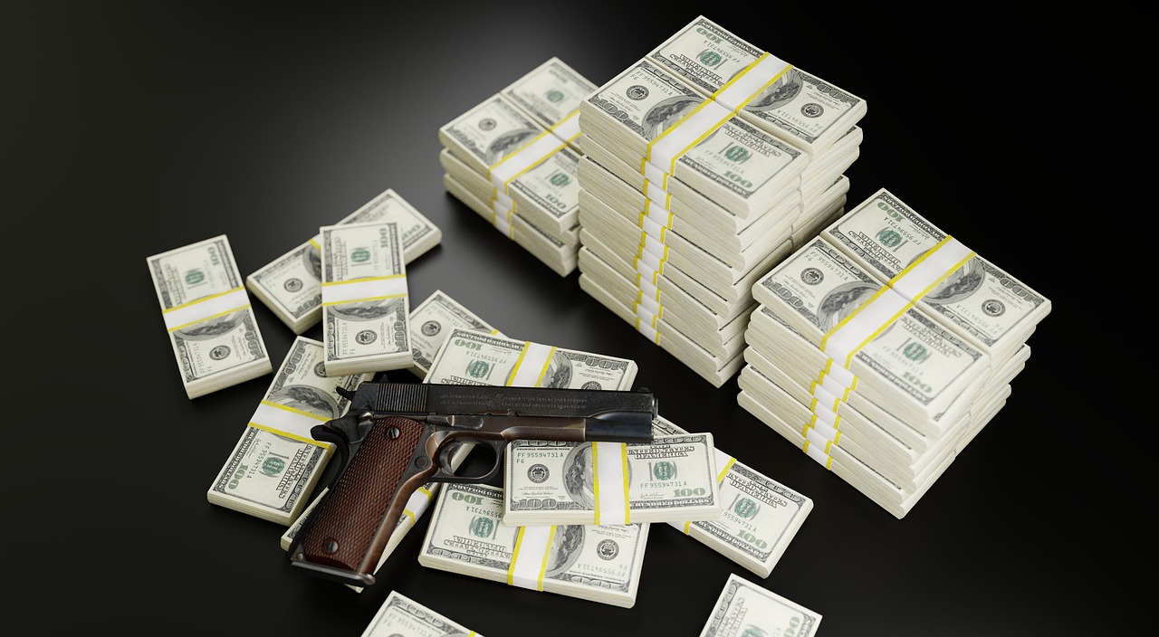Money and gun. 
